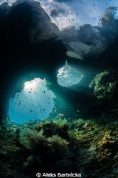 The famous Boo Windows in Raja Ampat on an early morning.... by Aleks Bartnicka 